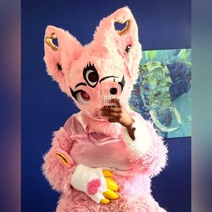 Hello I’m selling this pink piggy fur-suit she is a 3/4 suit pink and gold.